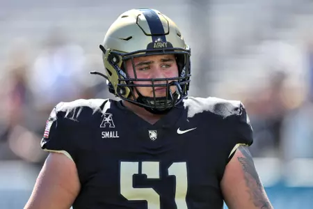 Sep 20, 2025; West Point, New York, USA; Army Black Knights offensive lineman Brady Small (51) warms up during the first half against the North Texas Mean Green at Michie Stadium. Mandatory Credit: Danny Wild-Imagn Images