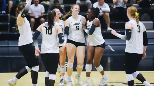 Volleyball Celebrates a Point Against Lehigh