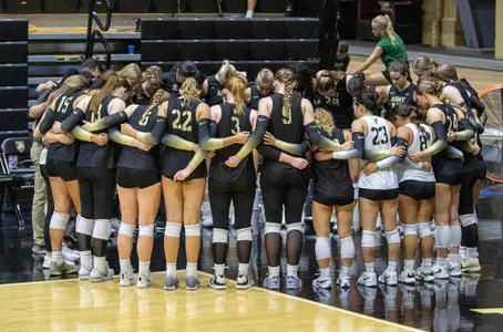 Army Volleyball Huddles Before Their Match Against Hofstra