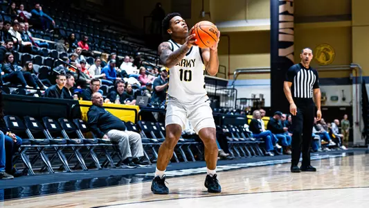 Jacen Holloway Line Up a Three Pointer Inside Christl Arena