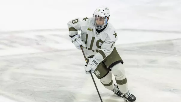 Vincent Salice (8) skates with the puck in a game at Tate Rink against Sacred Heart on Feb. 28, 2026