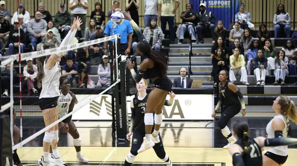 VIctoria Kasanganay Goes Up for a Hit against Lehigh