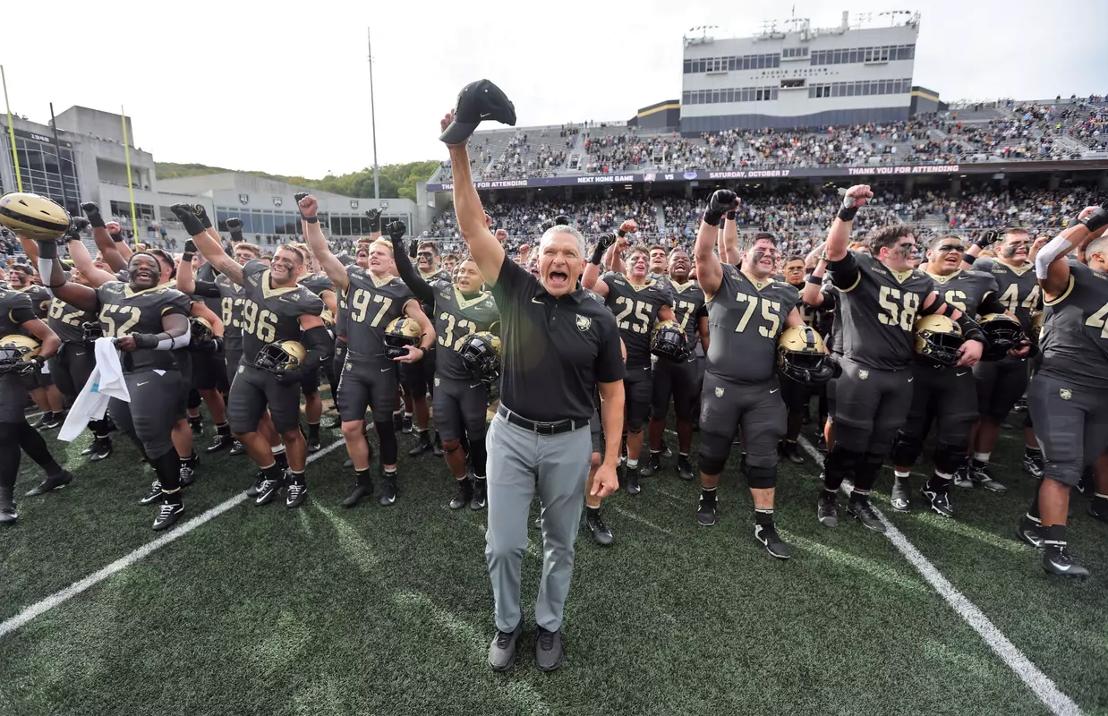 Oct 10, 2026; West Point, New York, USA; Army Black Knights head coach Jeff Monken celebrates with his team after a 20-17 win against the Tulane Green Wave at Michie Stadium. Mandatory Credit: Danny Wild-Imagn Images