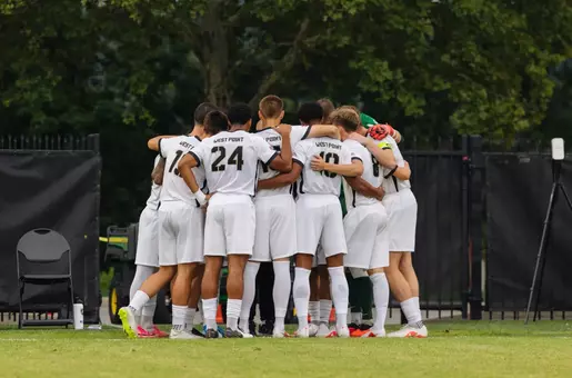 Army men's soccer team huddles before a match against Yale at Malek Stadium