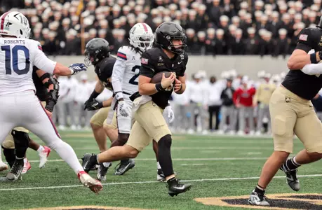 Army Quarterback Cale Hellums rushes for one of his five touchdowns vs. FAU.