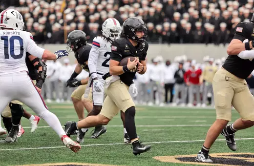 Army Quarterback Cale Hellums rushes for one of his five touchdowns vs. FAU.