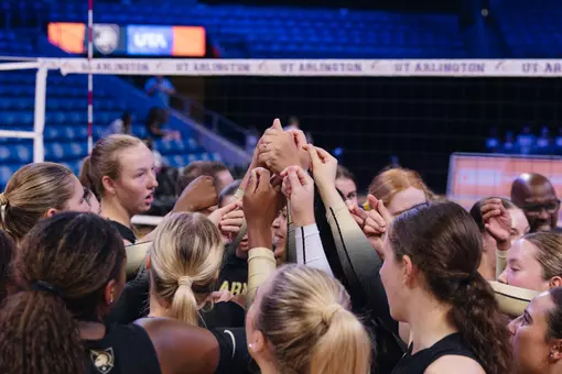Volleyball Huddles After Win Over UT Arlington