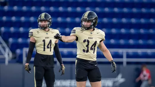 Sprint Football's Reed Hisle (34) reads the offense during a game against Navy on Sept. 25, 2026