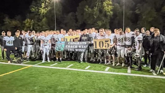 Sprint Football celebrates Head Coach Mark West in a 70-0 victory over STAC on Friday, Oct. 23, 2026