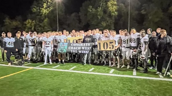 Sprint Football celebrates Head Coach Mark West in a 70-0 victory over STAC on Friday, Oct. 23, 2026