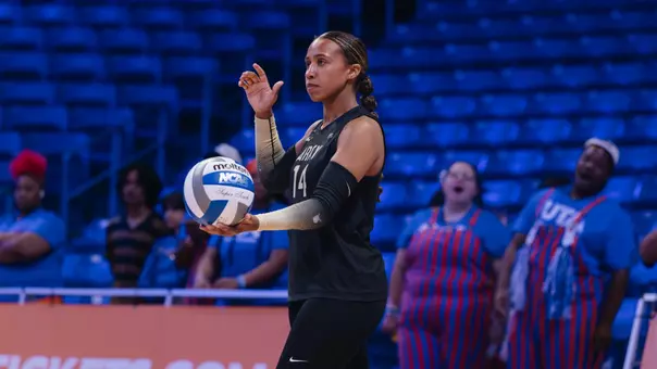 Hannah Hankerson Prepares to Serve the Ball at UT Arlington