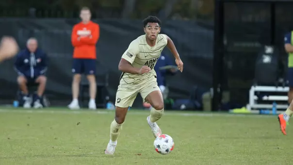 Jubril Bamgbala forward for Army Men's Soccer kicks ball in game vs Bucknell