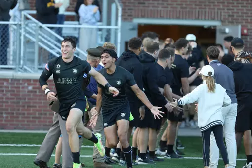 The Army men's rugby team takes the field before a match at Anderson Rugby Complex.