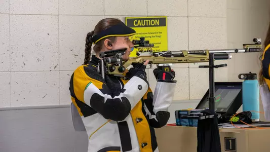 Arlington Ashton looks at the target to fire a shot during Air Rifle during a match against West Virginia on Oct. 3, 2026