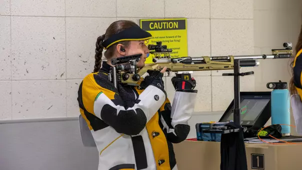 Arlington Ashton looks at the target to fire a shot during Air Rifle during a match against West Virginia on Oct. 3, 2026