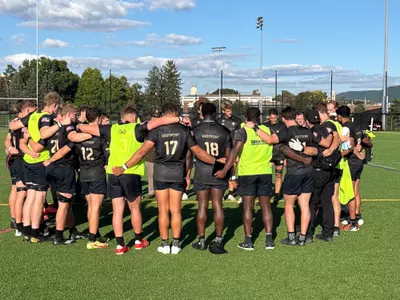 The Army Men's Rugby team huddles after a 43-8 win at Penn State.