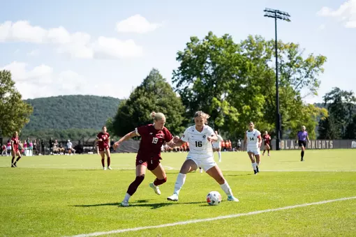Leila Castell battles a Boston College defender for possession