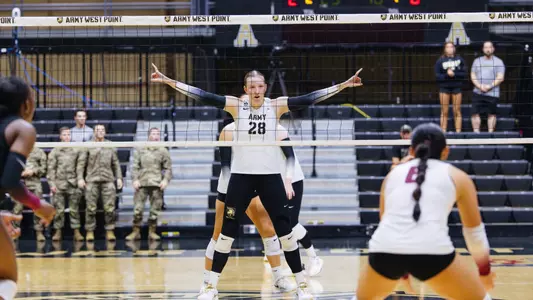 Corrine Blackburn Stands at the Net Against Lafayette