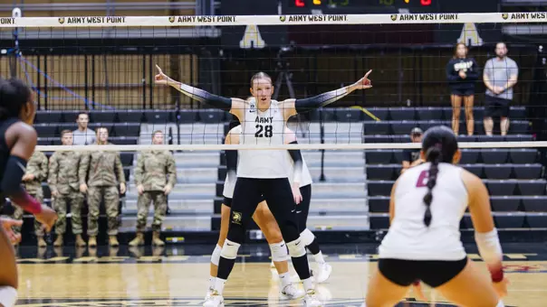 Corrine Blackburn Stands at the Net Against Lafayette