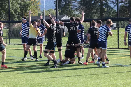 The Army Men's Rugby team celebrates a try at Penn State.