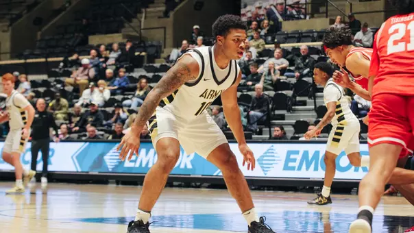 Jacen Holloway Applies Pressure Against Defender