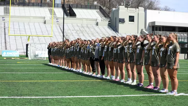 Army West Point women's lacrosse salutes during the National Anthem in a game against American on April 4, 2026