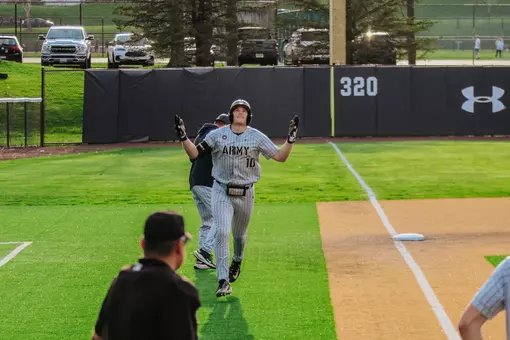Overbeek celebrates after a home run.