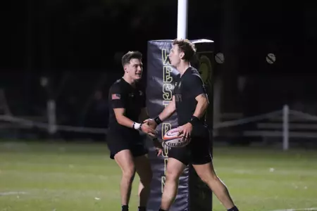 Army Rugby players celebrate a try.