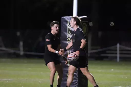 Army Rugby players celebrate a try.