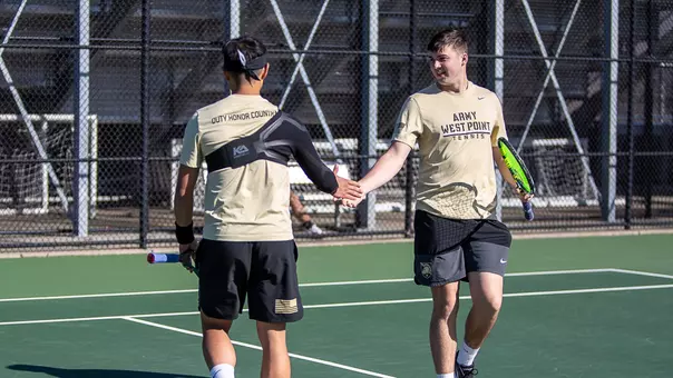Tucker Culpepper and Marcus Sebastian high five after a doubles point