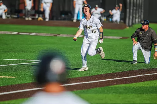 Chris Barr celebrates a triple turned run on an E6