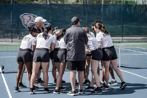 Army Women's Tennis huddles before its postseason match.