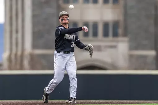 Thomas Schreck throws the ball back to the pitcher.