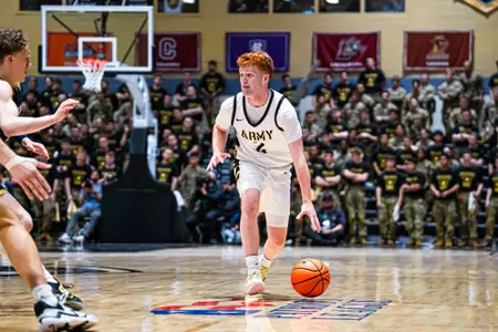 Ryan Curry Dribbles the Ball Towards the Navy Defense in the Star Game at Christl Arena