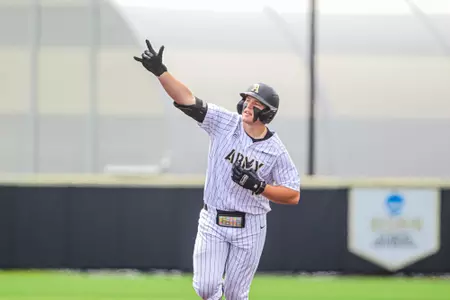 Josiah Overbeek celebrates a home run in Army's win over Lafayette.