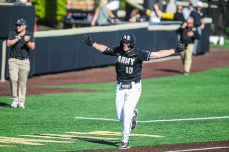 Josiah Overbeek celebrates a walk-off homer vs. Lafayette.