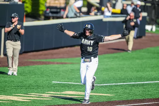 Josiah Overbeek celebrates a walk-off homer vs. Lafayette.