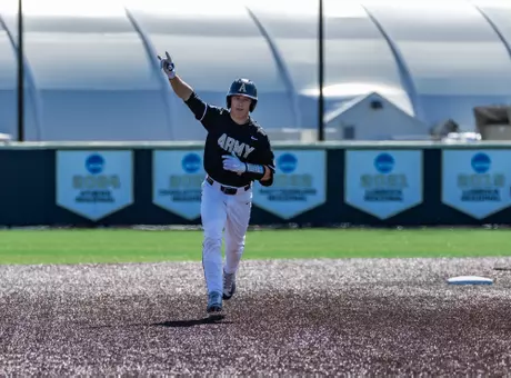 Zac Farrell trots the bases after a grand slam vs. Lafayette.