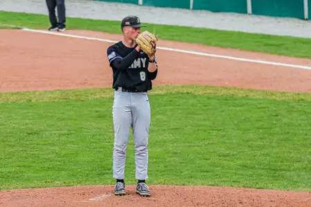Kevin Reavey prepared to wind up before a pitch.