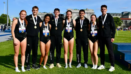 Army's men and women 4x800m relay teams pose for a picture with their gold medals at Patriot League Championships