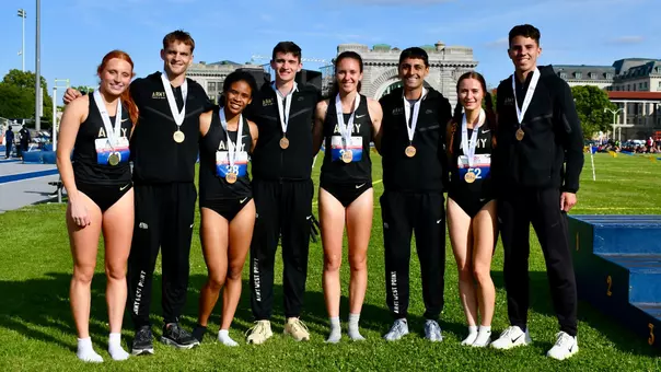 Army's men and women 4x800m relay teams pose for a picture with their gold medals at Patriot League Championships