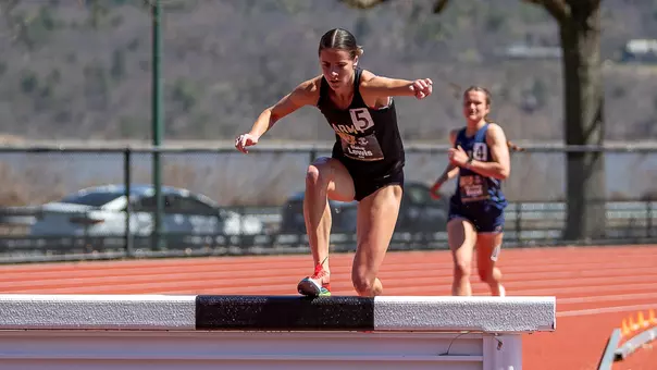 Claire Lewis competes in the 3000m steeplechase at the Army-Navy Meet