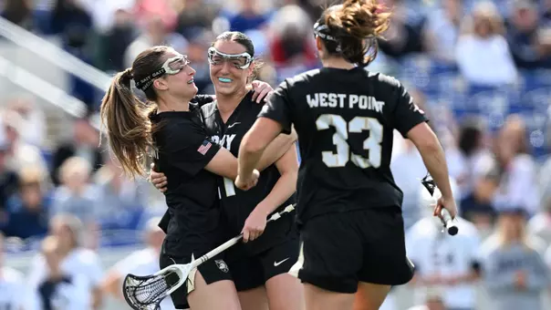 Brigid Duffy and Ryan Remaly celebrate a goal during the Patriot League Championship on May 2, 2026