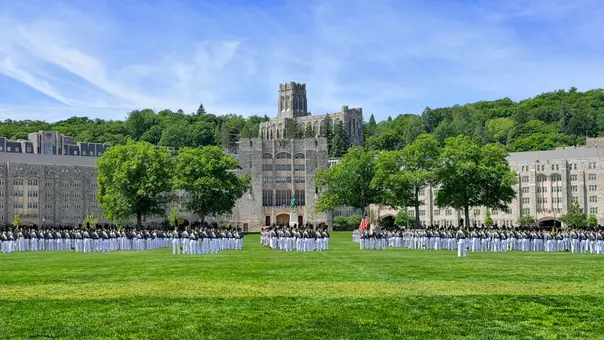 Photo of the Class of 2026 Graduation formation in front of Washington Statue.