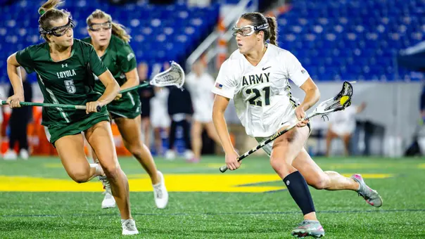 Brigid Duffy (#21) runs with the ball during the Patriot League Tournament Semifinals against Loyola Maryland on April, 30 2026 in Annapolis, Md.