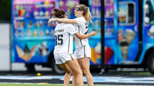 Geneva Milch Cesoni (35) and Allison Reilly (23) celebrate a goal in the 2026 NCAA Tournament First Round against Fairfield on May 8, 2026 at Homewood Field in Baltimore, Md.
