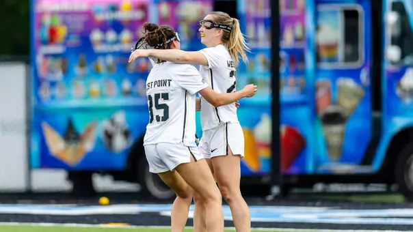 Geneva Milch Cesoni (35) and Allison Reilly (23) celebrate a goal in the 2026 NCAA Tournament First Round against Fairfield on May 8, 2026 at Homewood Field in Baltimore, Md.