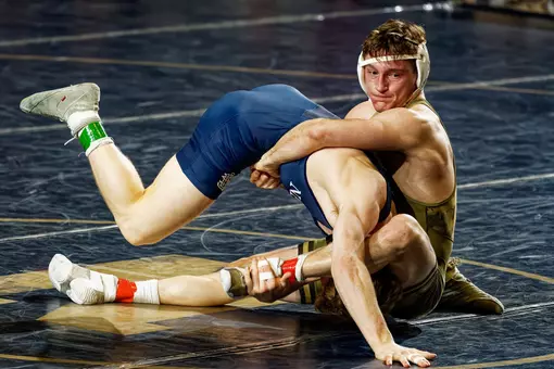 Andrew Christie competes in the Army-Navy star dual in Annapolis. Army won the dual, 19-18.