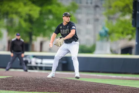 Andrew Berg pitches at Doubleday Field in 2026.