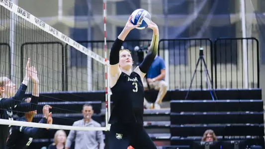 Juliette Myrick Sets the Ball for the Black Knights against Binghamton Inside Gillis Field House